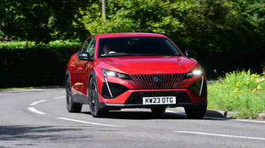 peugeot-408-gt-in-elixir-red-pictures-auto-express
